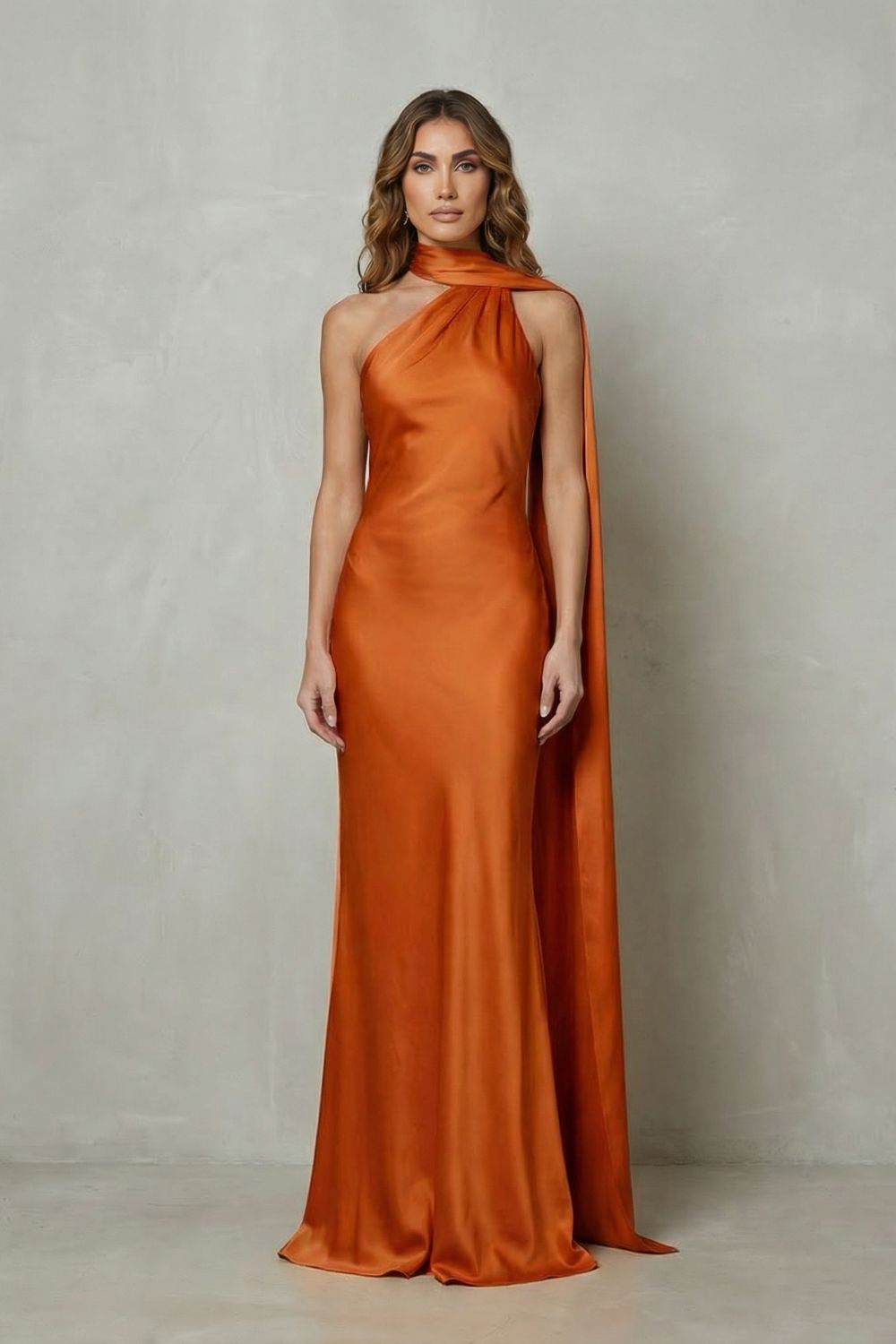 Rust orange formal halter draped open back maxi dress with a long flowing train, an elegant dress for wedding guests.