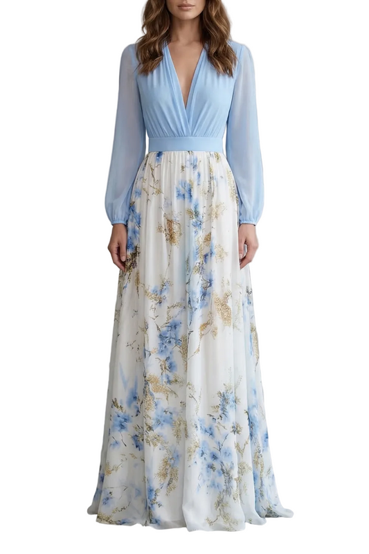 Full-length women's summer floral maxi dress with light blue long-sleeve V-neck top and white skirt with blue and gold floral print, ideal for vacation outfits.