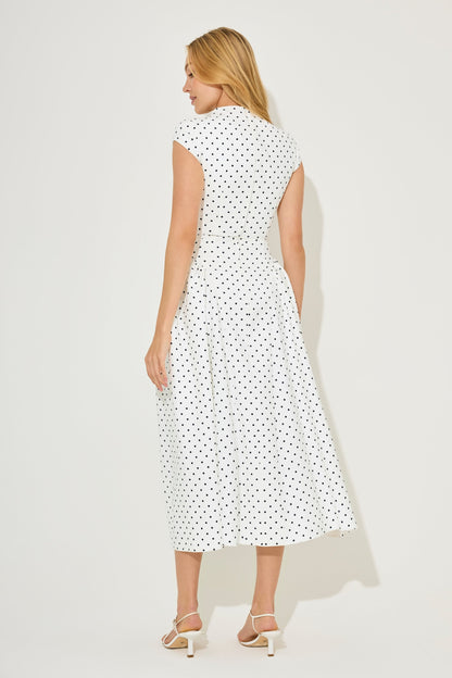 Back view of white polka dot cap sleeve midi summer dress with gathered skirt and fitted waist