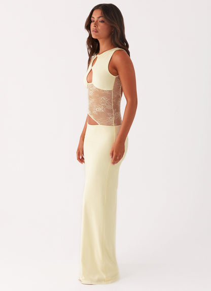 Side view cream lace cutout open back maxi dress with asymmetrical waist and fitted skirt