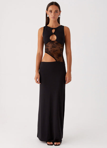 Front view black bodycon maxi dress with lace cutout waist and fitted floor length skirt