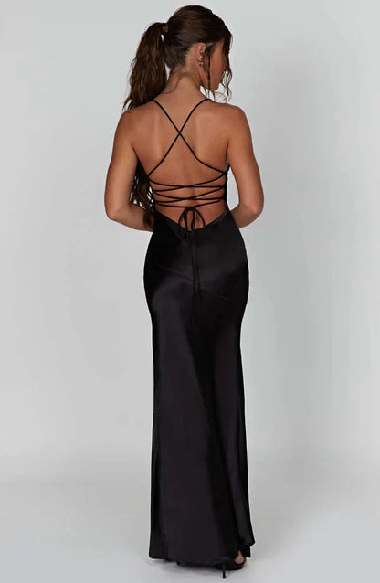 Back view of black satin maxi dress with strappy lace-up back detail