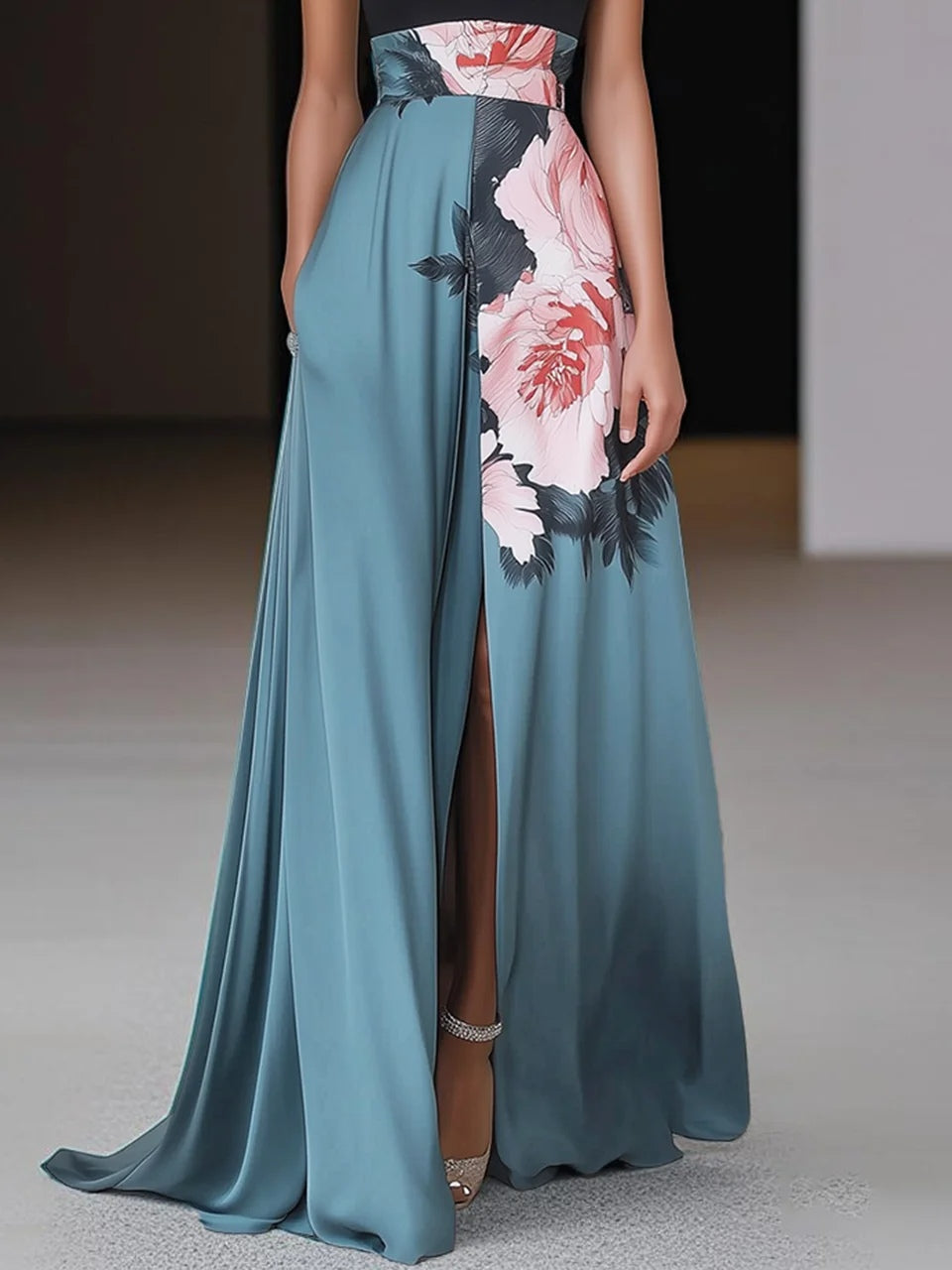 Teal A-line maxi dress skirt detail with pink floral print panel, high slit, and flowing hem