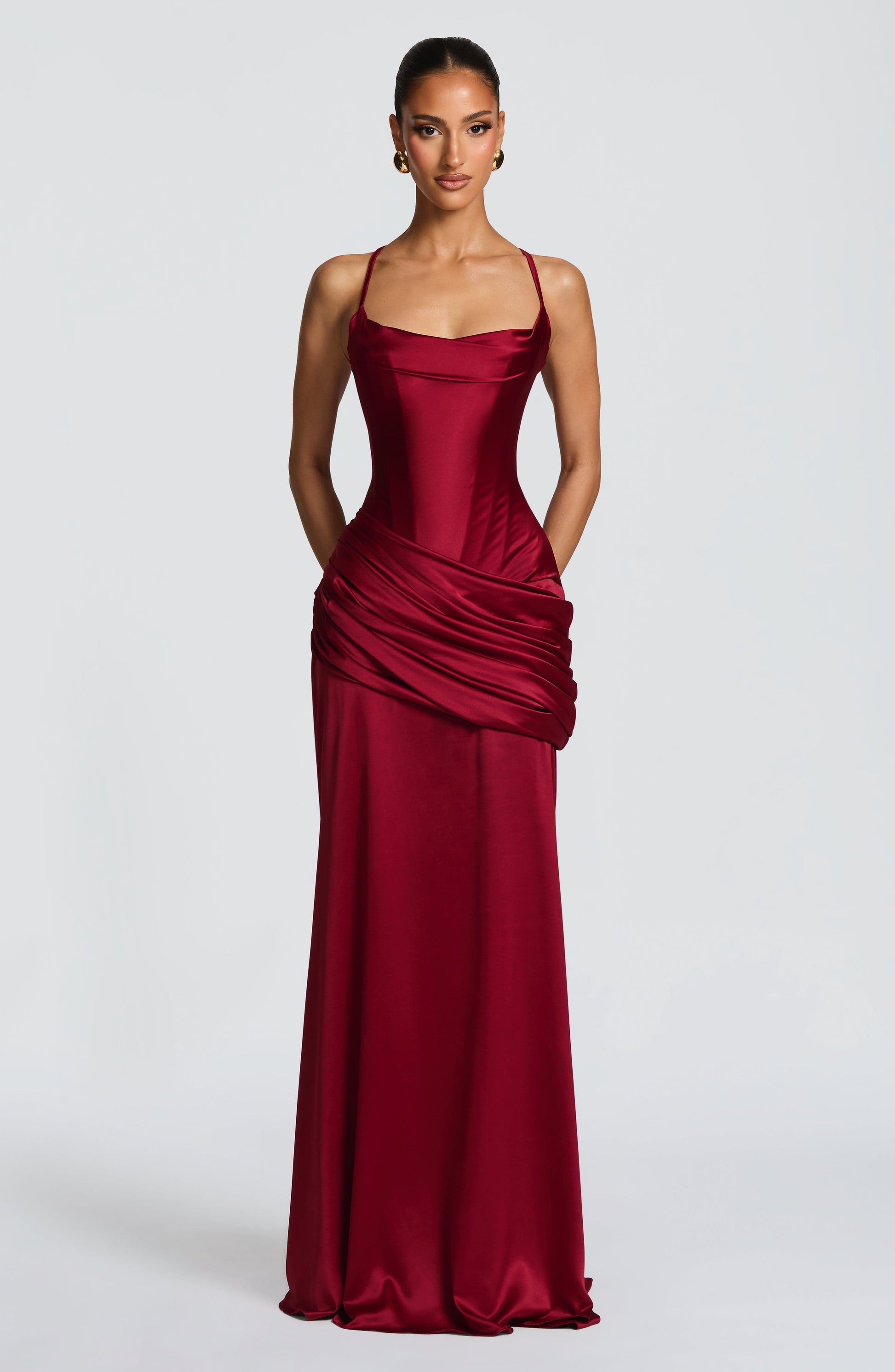 Straight-on burgundy satin maxi dress with corset bodice, smooth skirt and ruched wrap detail