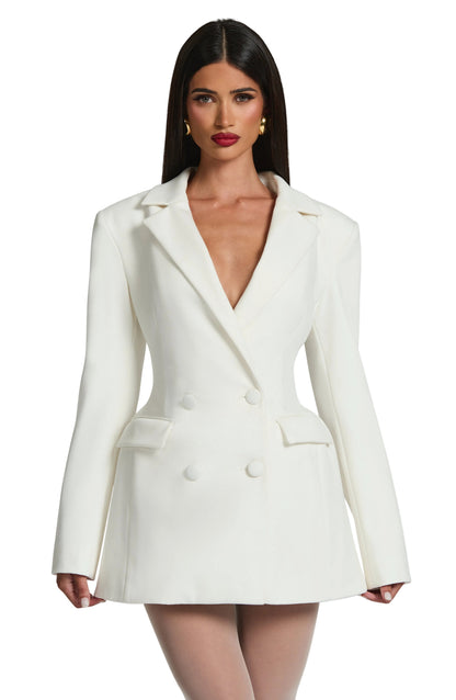 Front view of a white double-breasted mini dress with shoulder pads, featuring a deep V-neck and four white buttons.