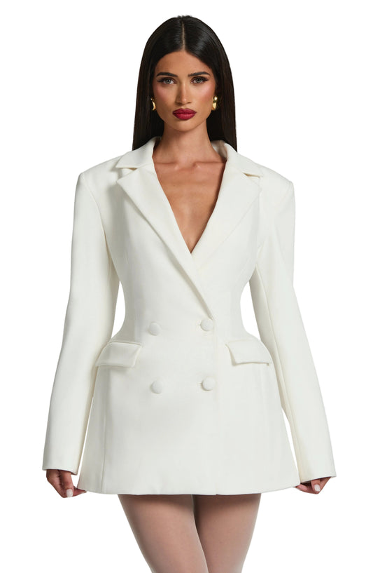 Front view of a white double-breasted mini dress with shoulder pads, featuring a deep V-neck and four white buttons.