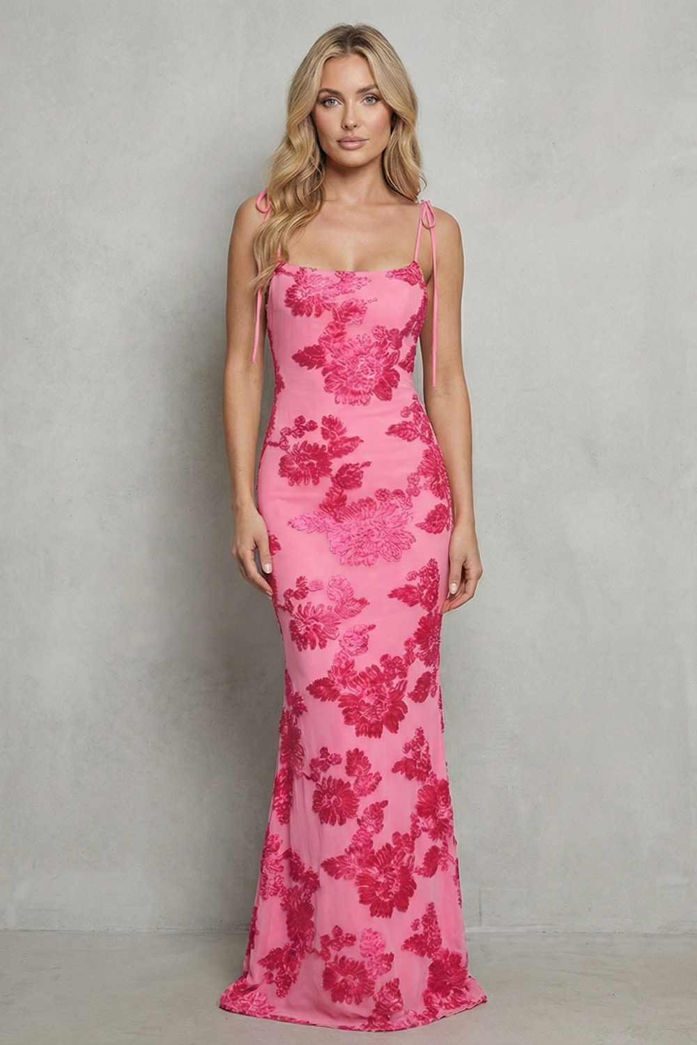 Front view of the striking pink floral appliqué scoop neck maxi dress with tie shoulders, an elegant dress for wedding guests.