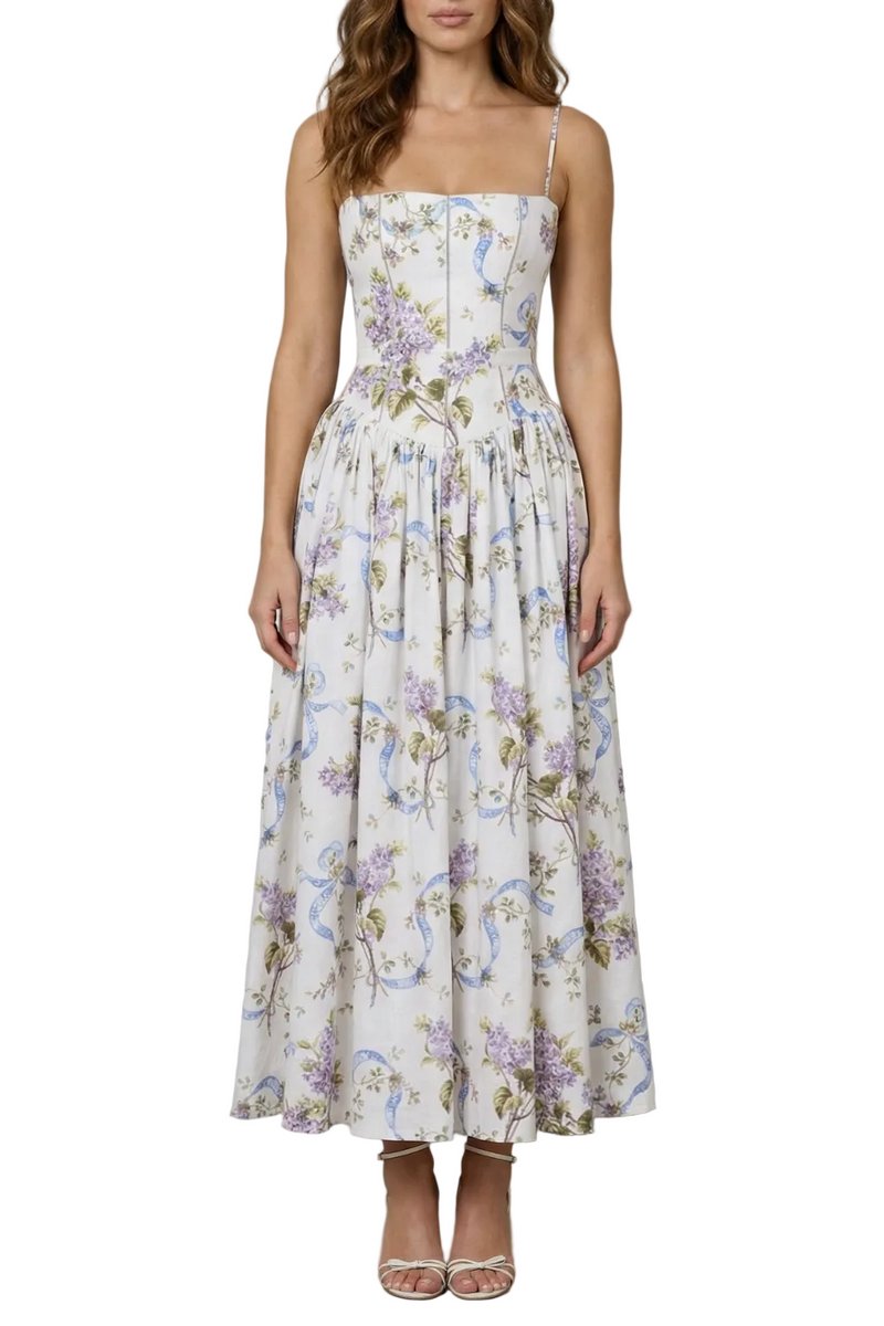 Women's white floral corset bodice midi dress with delicate shoulder straps and a full skirt, featuring purple flowers and blue ribbon patterns.