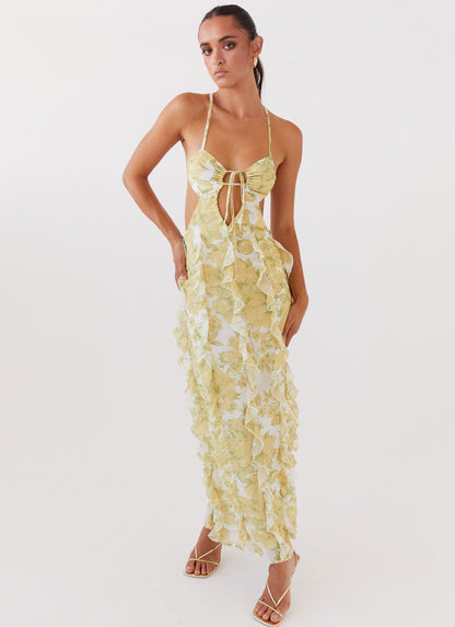 Full view of women's floral cut out ruffle tie front maxi dress with spaghetti straps and open back, elegant dresses for wedding guests.