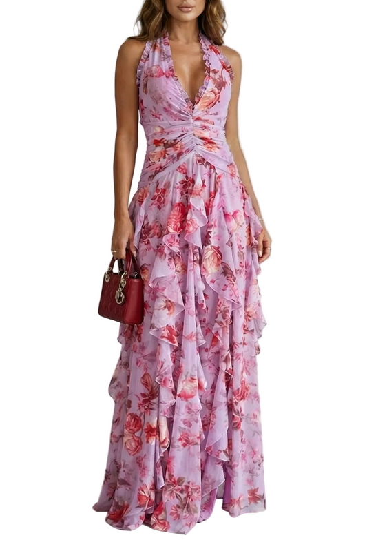 Elegant purple floral halter maxi dress with deep V-neck and tiered ruffles, perfect for wedding guests.