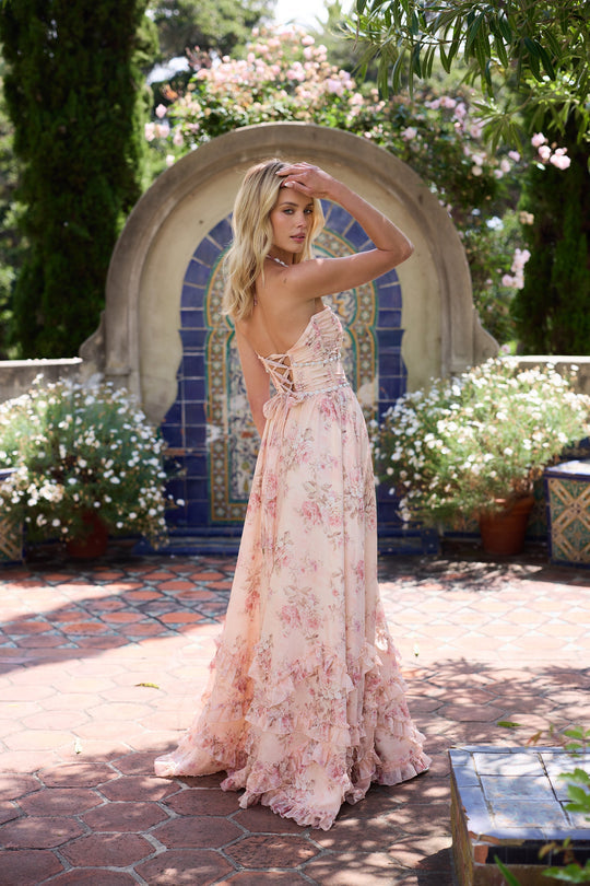 Back view peach tapestry maxi dress with lace-up corset back, halter neckline and tiered ruffle skirt