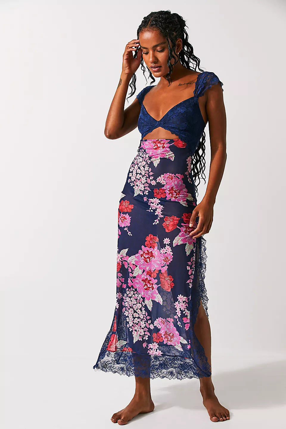 Front view of a women's navy blue floral lace cut out back maxi dress with a prominent pink and red floral pattern, great for beach dress for women.