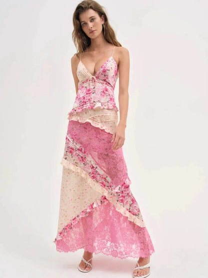 Front view of women's pink floral lace V-neck maxi dress with ruffled bodice and tiered skirt, ideal for vacation outfits