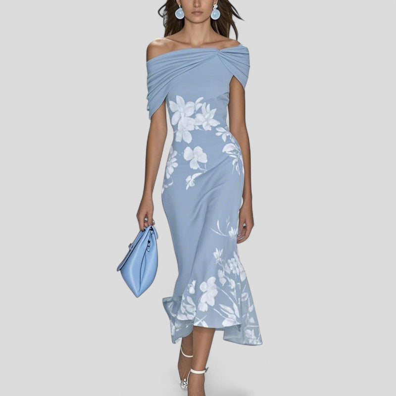 Light blue off-shoulder midi dress with white floral print, ruched detailing, and a high-low ruffled hem. Elegant midi dress for women.