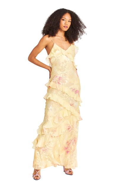 Full length front view of the light yellow floral ruffle strap maxi dress, showcasing the elegant design and flowy fabric.