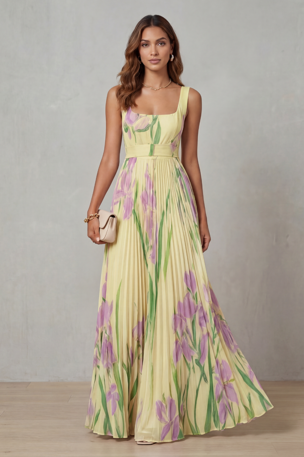 Full view of a women's yellow floral square neck maxi dress with pleated skirt, a stylish option for wedding guests.