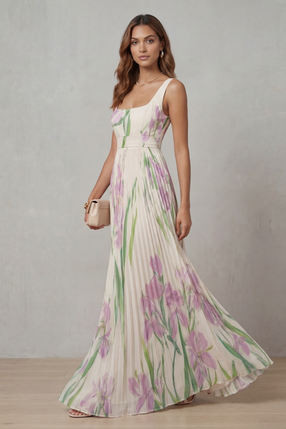 Side view of a flowing white floral maxi dress with a square neckline, pleated skirt, and purple iris print, ideal for vacation outfits.