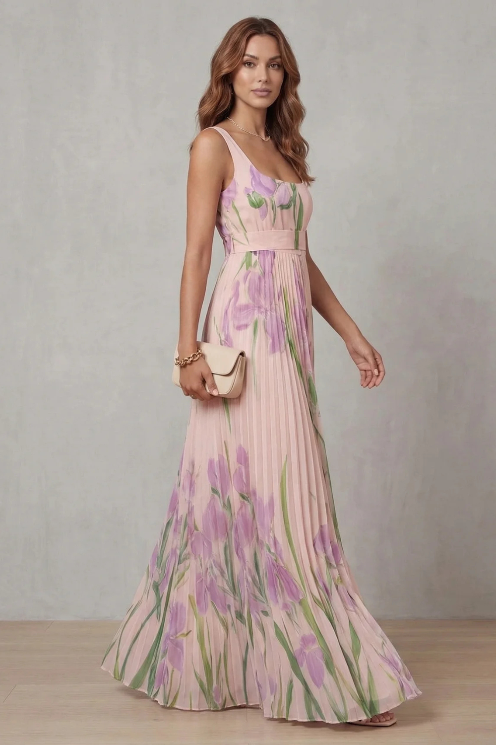 Side view of a women's pink floral square neck maxi dress with a flowing pleated skirt, suitable for vacation outfits.