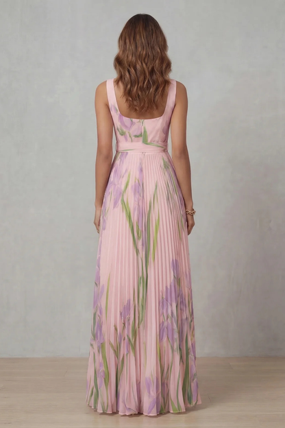 Back view of a women's pink floral square neck maxi dress, showcasing the pleated details and elegant design.