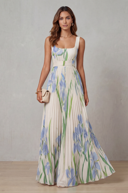 Full view of a women's white floral square neck maxi dress with blue and green accents, an elegant wedding guest dress.