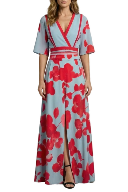 Women's light blue and red floral maxi dress with V-neckline, elbow-length sleeves, and front slit