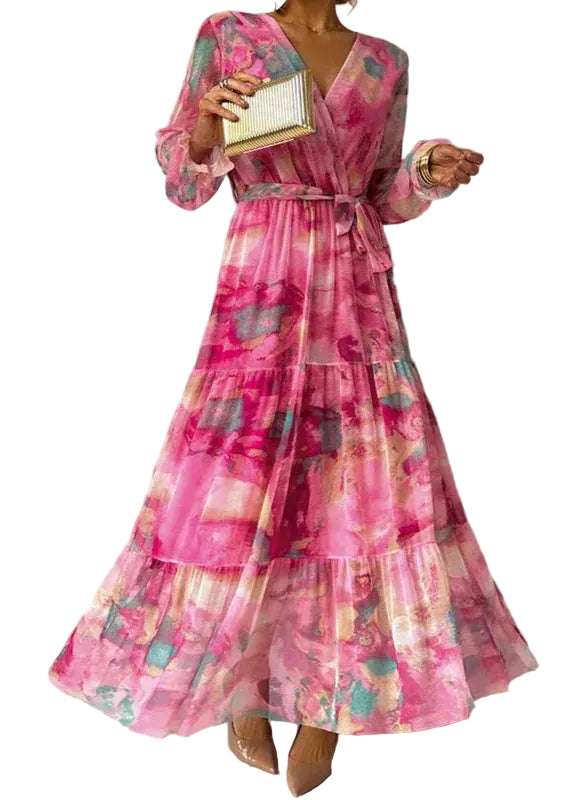 Pink watercolor floral tiered belted maxi dress with v-neck wrap bodice and long sheer sleeves