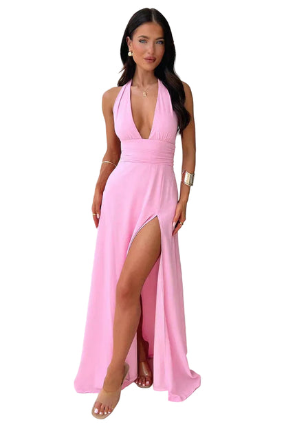 Pink halter neck maxi side slit dress with deep V neckline and floor-length skirt, front view