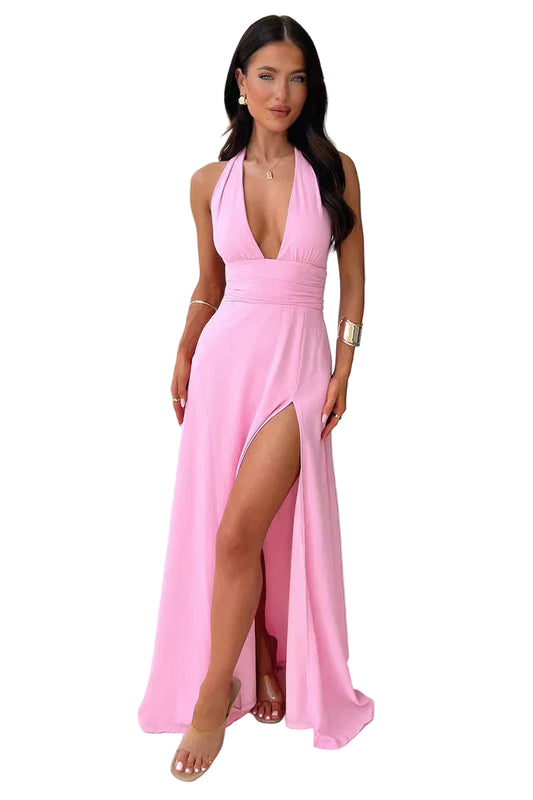 Pink halter neck maxi side slit dress with deep V neckline and floor-length skirt, front view
