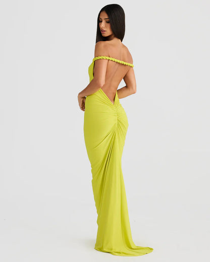 Side back view of lime green bodycon maxi dress with open back and ruched seat