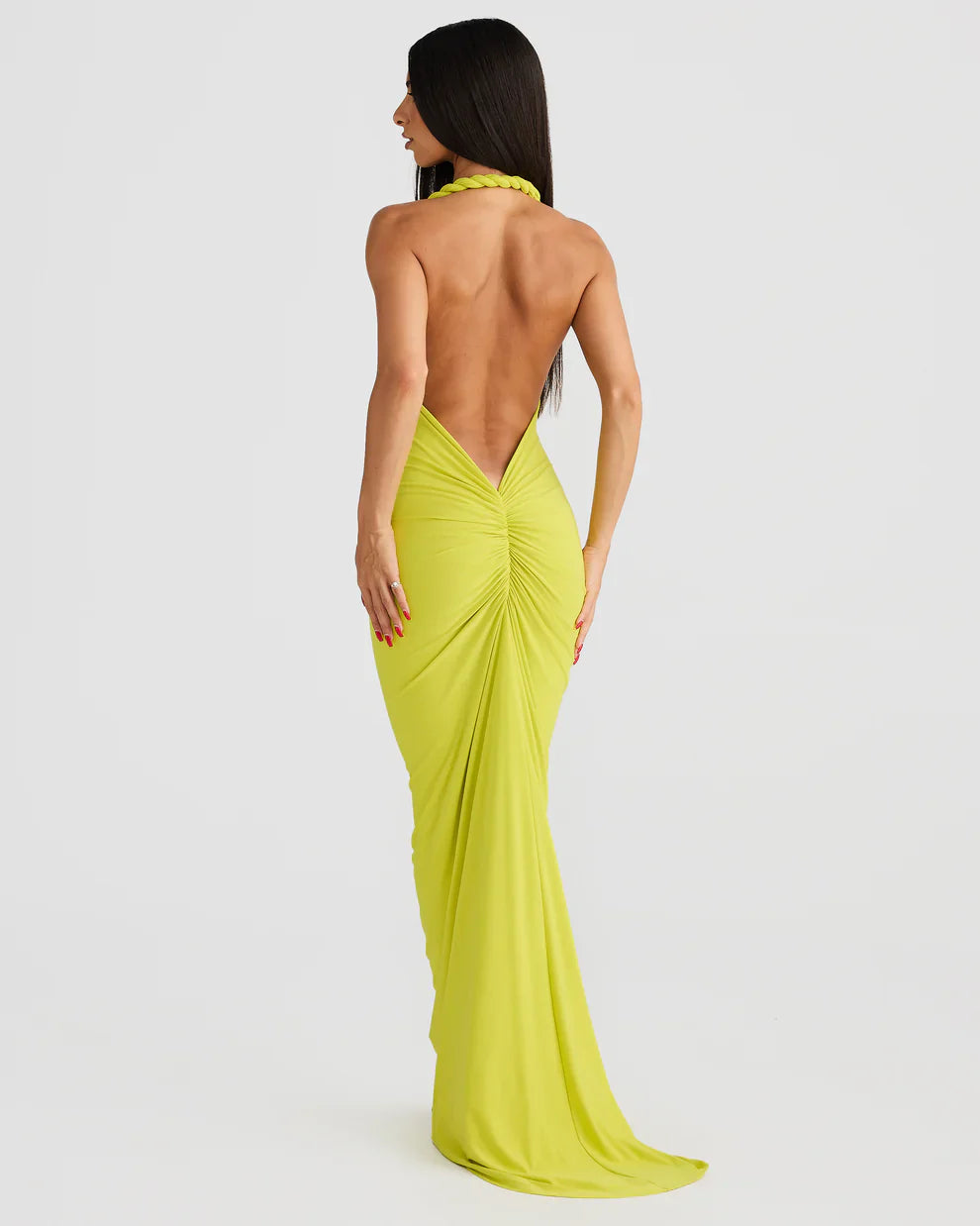Back view of lime green bodycon maxi dress with deep V open back and gathered ruching