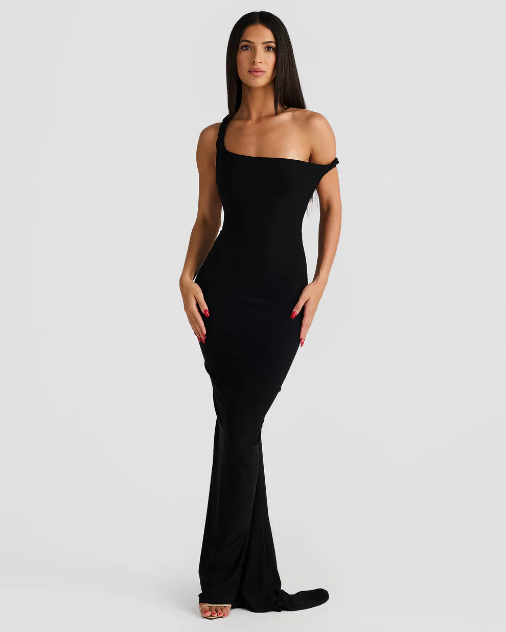 Black one-shoulder bodycon maxi dress with asymmetrical neckline and sleek fitted skirt