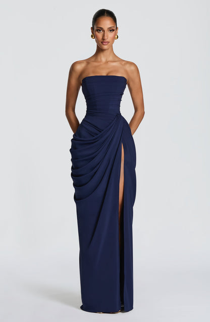 Navy strapless draped bodycon maxi dress with ruched hip drape and high leg slit, front view