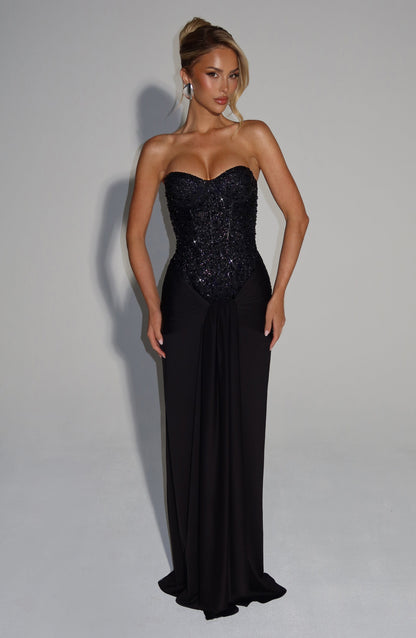 Black strapless sequin corset maxi dress with sweetheart neckline and fitted bodycon silhouette, full length