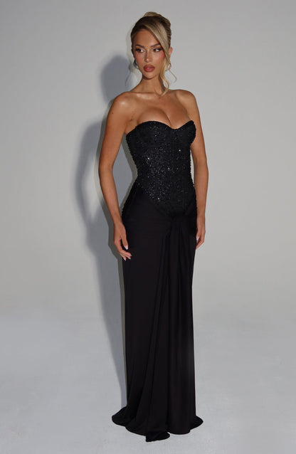 Full-length black formal strapless sequin corset maxi dress with draped waist detail and bodycon fit