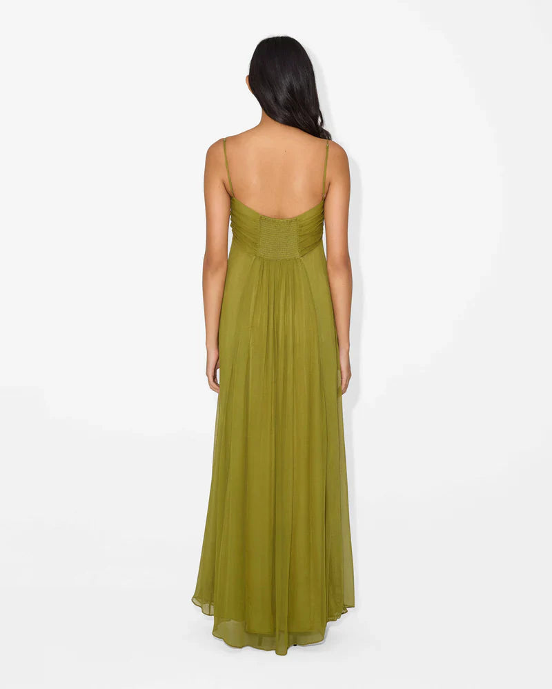 Back view of the olive green women's maxi dress, showing the gathered detail on the back and thin spaghetti straps.