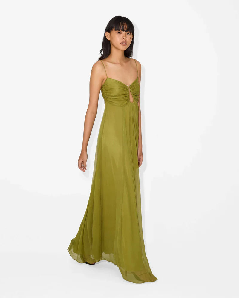 Side profile of a women's olive green gathered bust keyhole maxi dress, highlighting the flowing skirt and keyhole detail.
