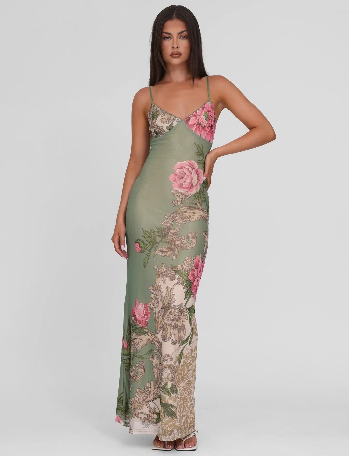 Sage green floral V-neck maxi dress with spaghetti straps and bodycon fit, front view