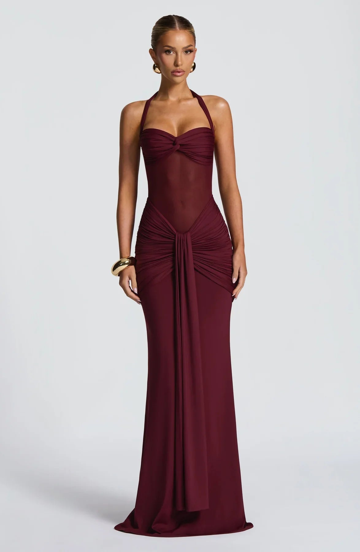 Full-length burgundy halter neck twisted ruched maxi dress, ideal for womens wedding guest dresses.