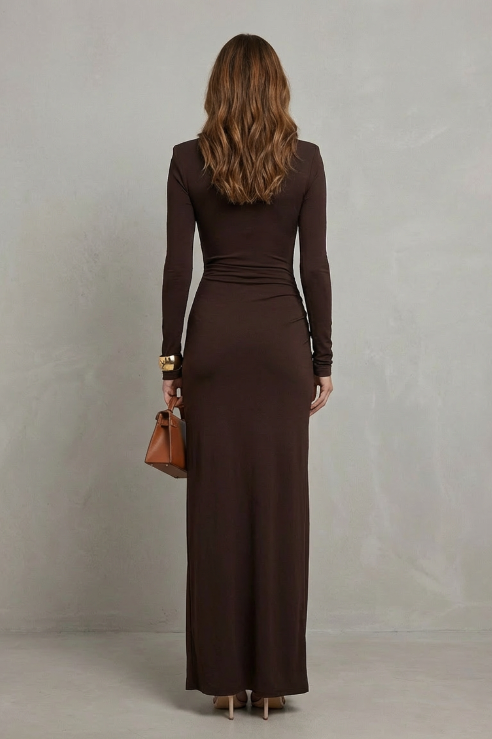 Back view of a brown high neck long sleeve maxi dress, showcasing the full length.