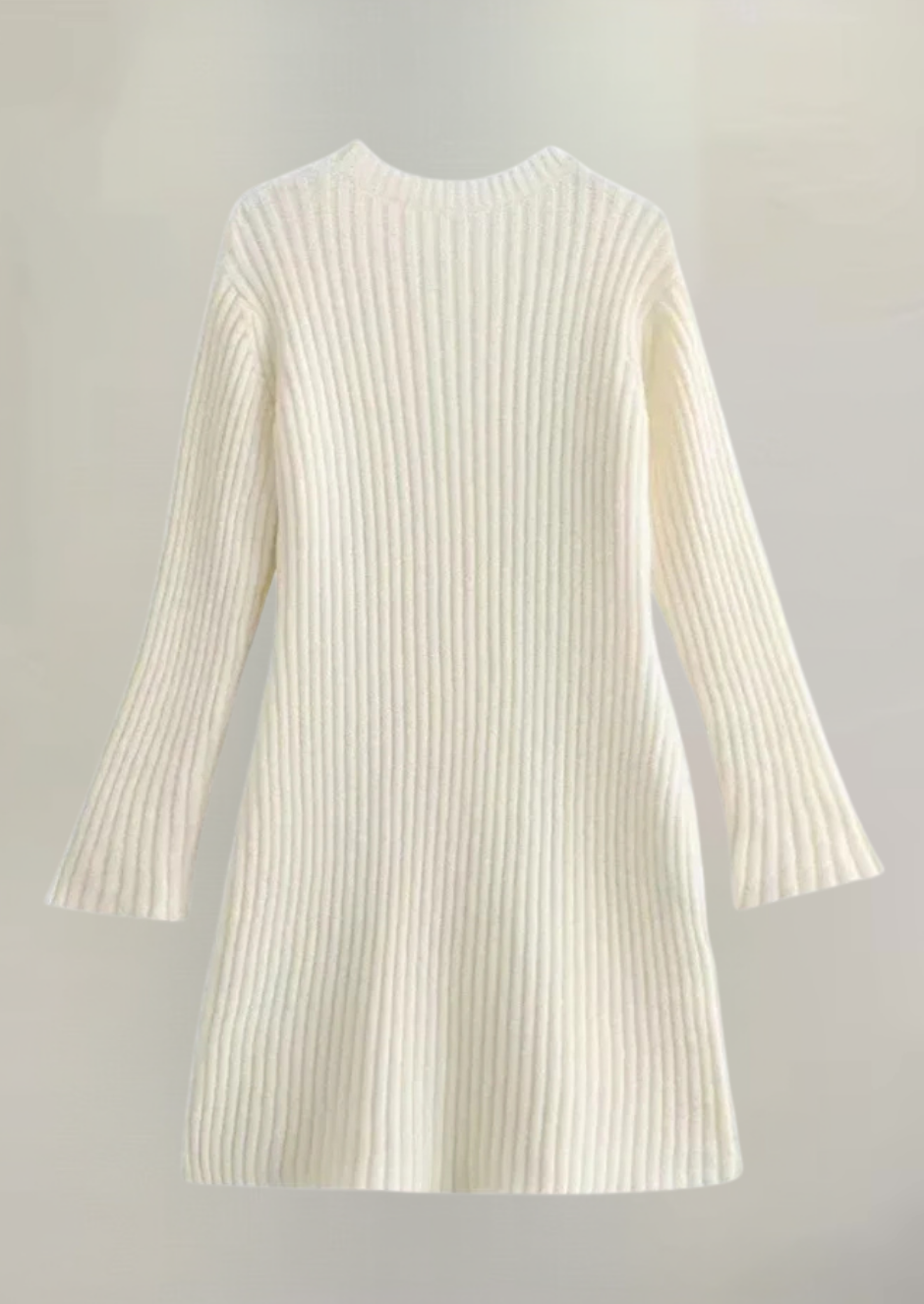 Back view flat lay of an ivory knit long sleeve ribbed mini dress, showing the full length and ribbed details from behind.