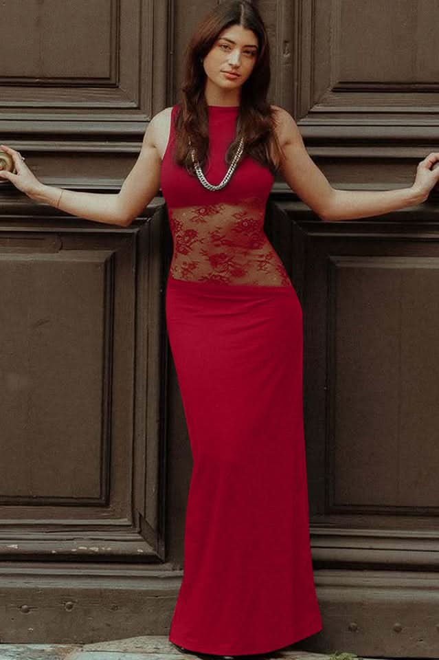 Red sleeveless cocktail maxi dress with sheer floral lace cutout waist, paired with a silver necklace.