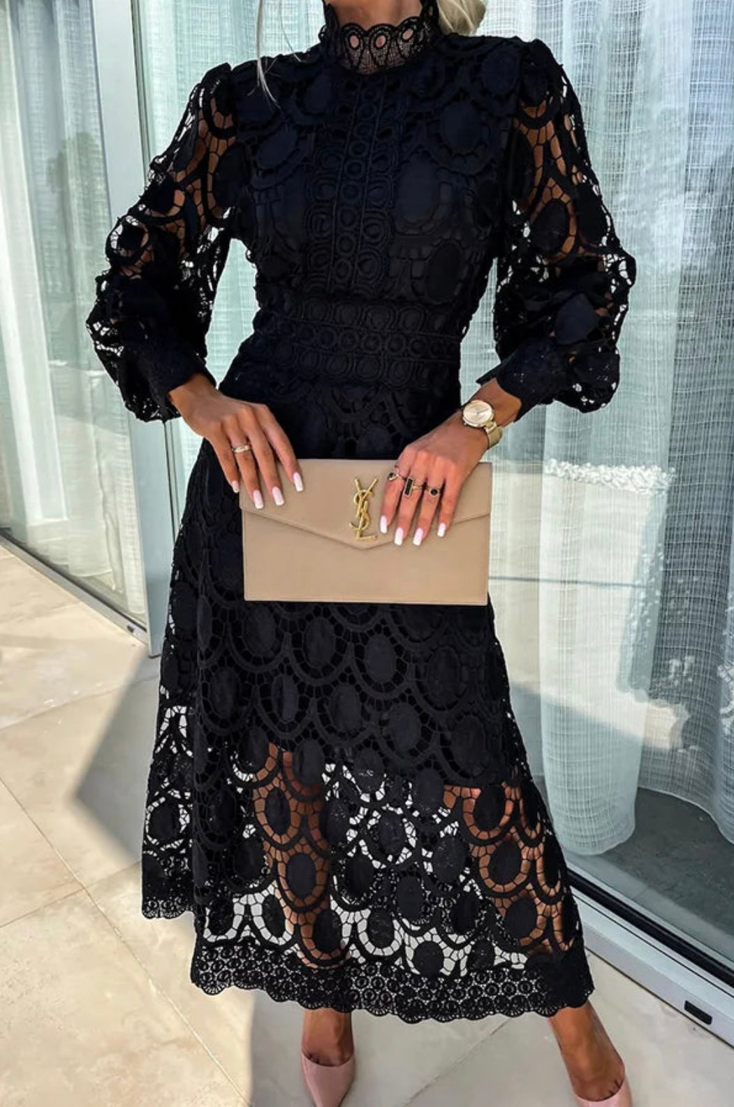 Black long sleeve lace wedding guest midi dress featuring sheer lace sleeves and scalloped hem