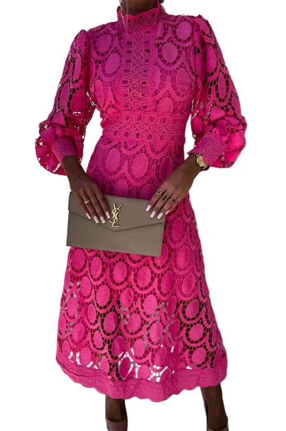 Fuchsia long sleeve lace wedding guest midi dress with high neck, puff sleeves, taupe clutch