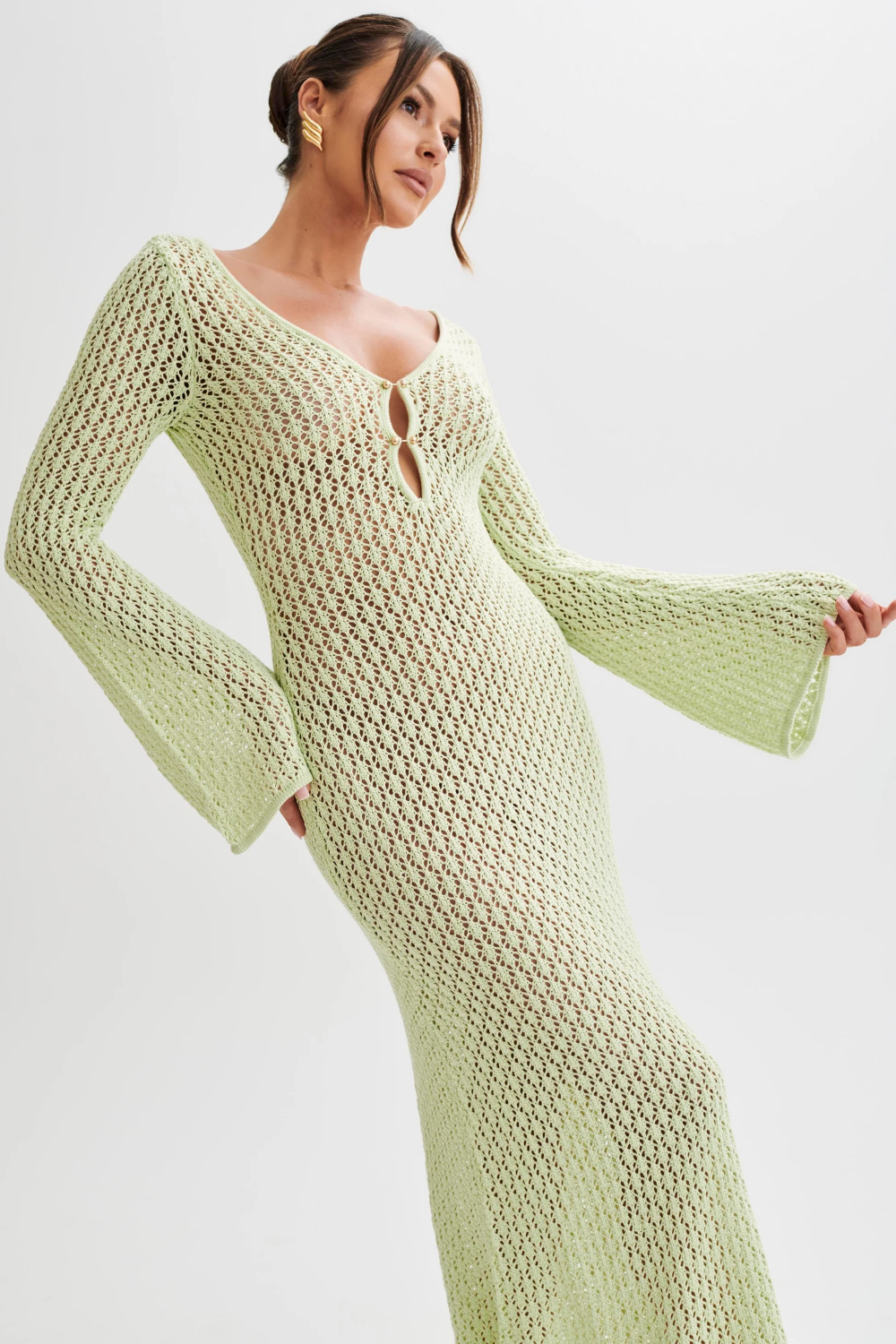 Sage green crochet maxi beach dress with V neck keyhole, long bell sleeves, fitted bodycon silhouette