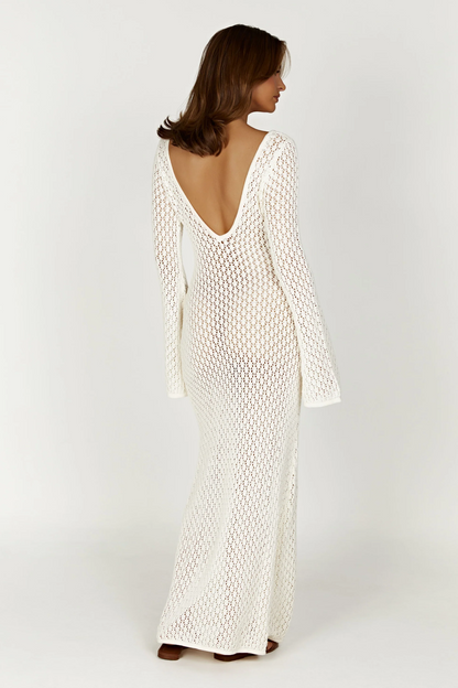 Back view of white open-knit crochet maxi beach dress with deep V back and long sleeves