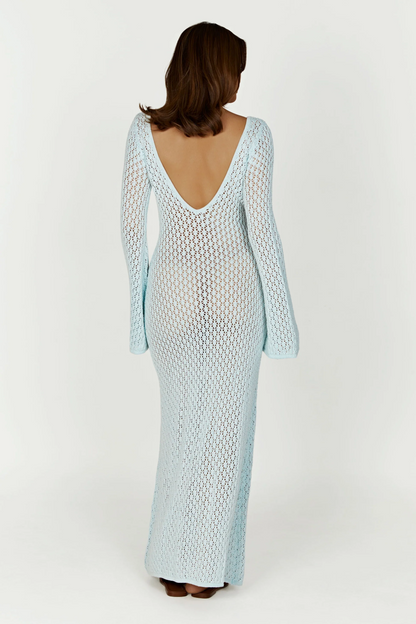 Back view of light blue crochet maxi beach dress with low V back, sheer open knit, long sleeves