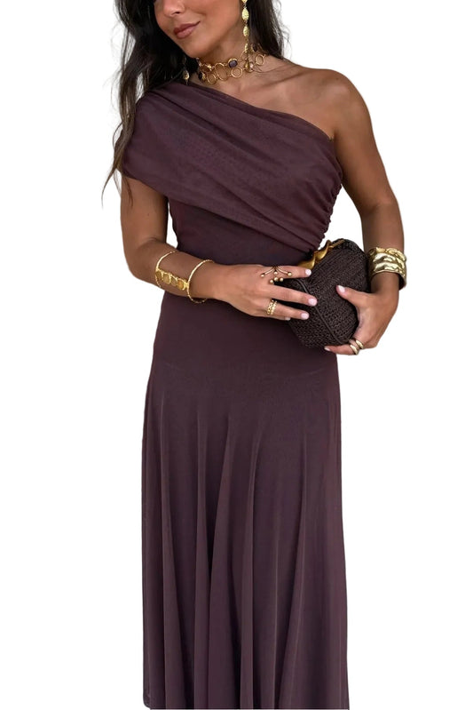 Elegant women's off-shoulder draped mesh maxi dress in a rich brown color, featuring a one-shoulder design and flowing skirt.