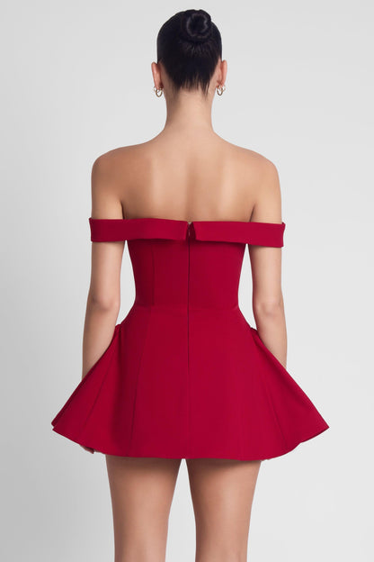 Back view of burgundy off shoulder sweetheart corset babydoll mini dress with center zipper detail