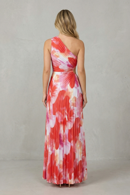 Women red and pink floral maxi dress back view showing one-shoulder design and full pleats