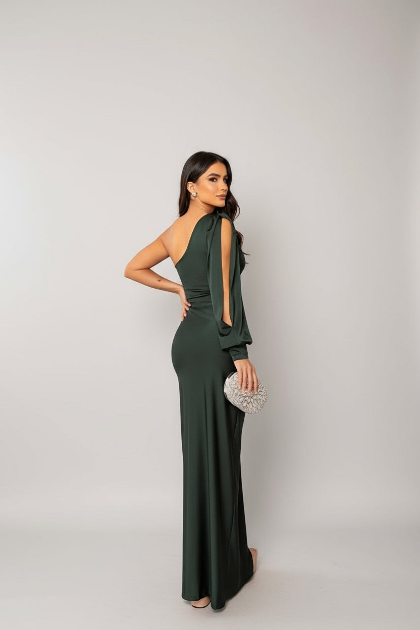 Rear view of the dark green one-shoulder maxi dress, highlighting the fitted silhouette and long sleeve detail, an elegant dress for wedding guests.